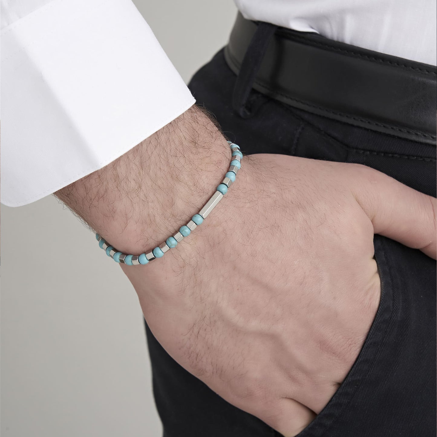 HERRENARMBAND AUS STAHL MIT TÜRKISFARBENEN STEINEN