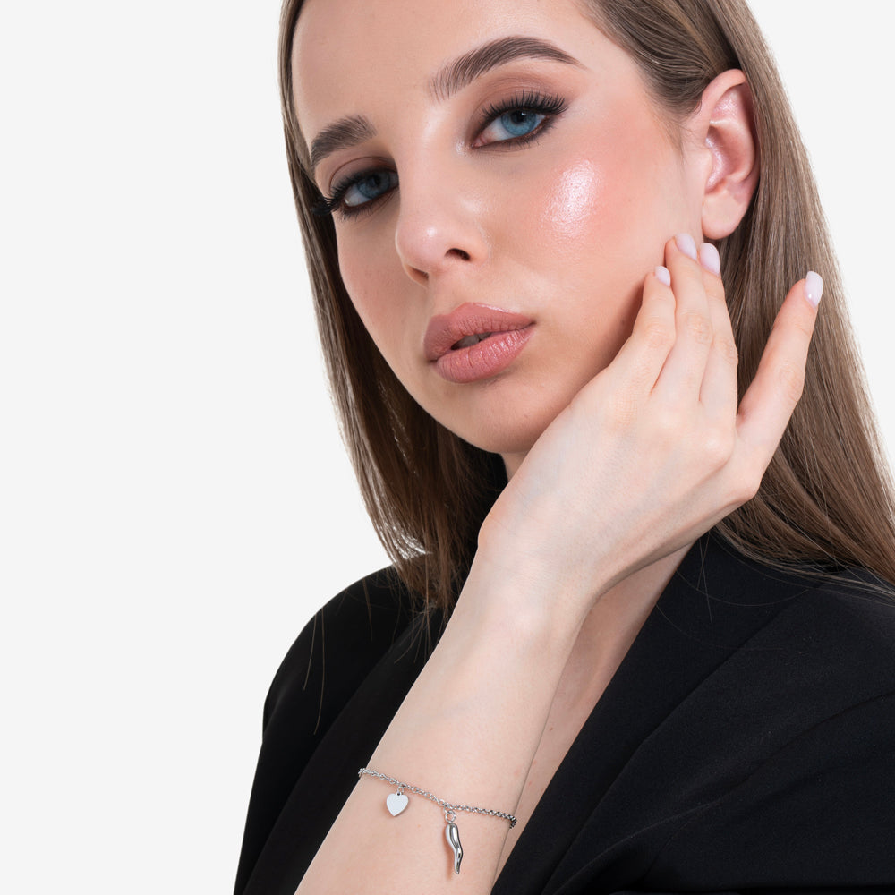 DAMENARMBAND AUS STAHL MIT HERZ UND HORN