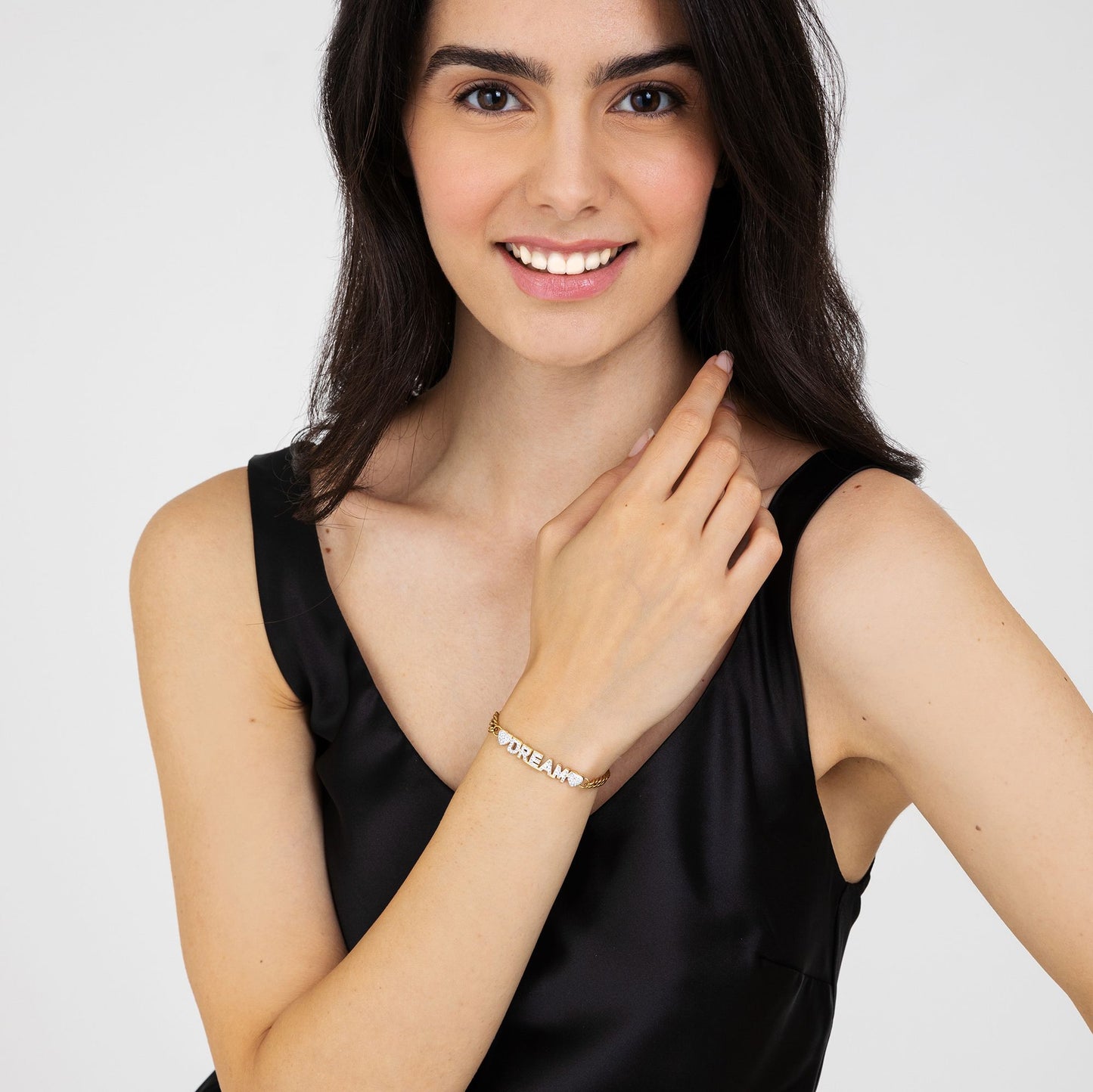 TRAUMHAFTES DAMENARMBAND AUS VERGOLDETEM STAHL MIT WEISSEN KRISTALLEN