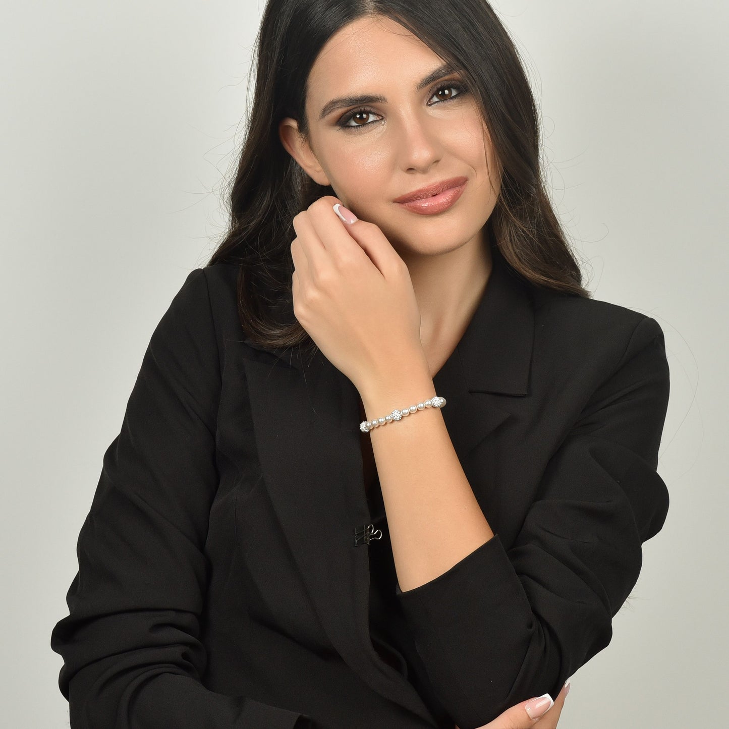 BRACCIALE DONNA DI PERLE SINTETICHE CON CRISTALLI BIANCHI