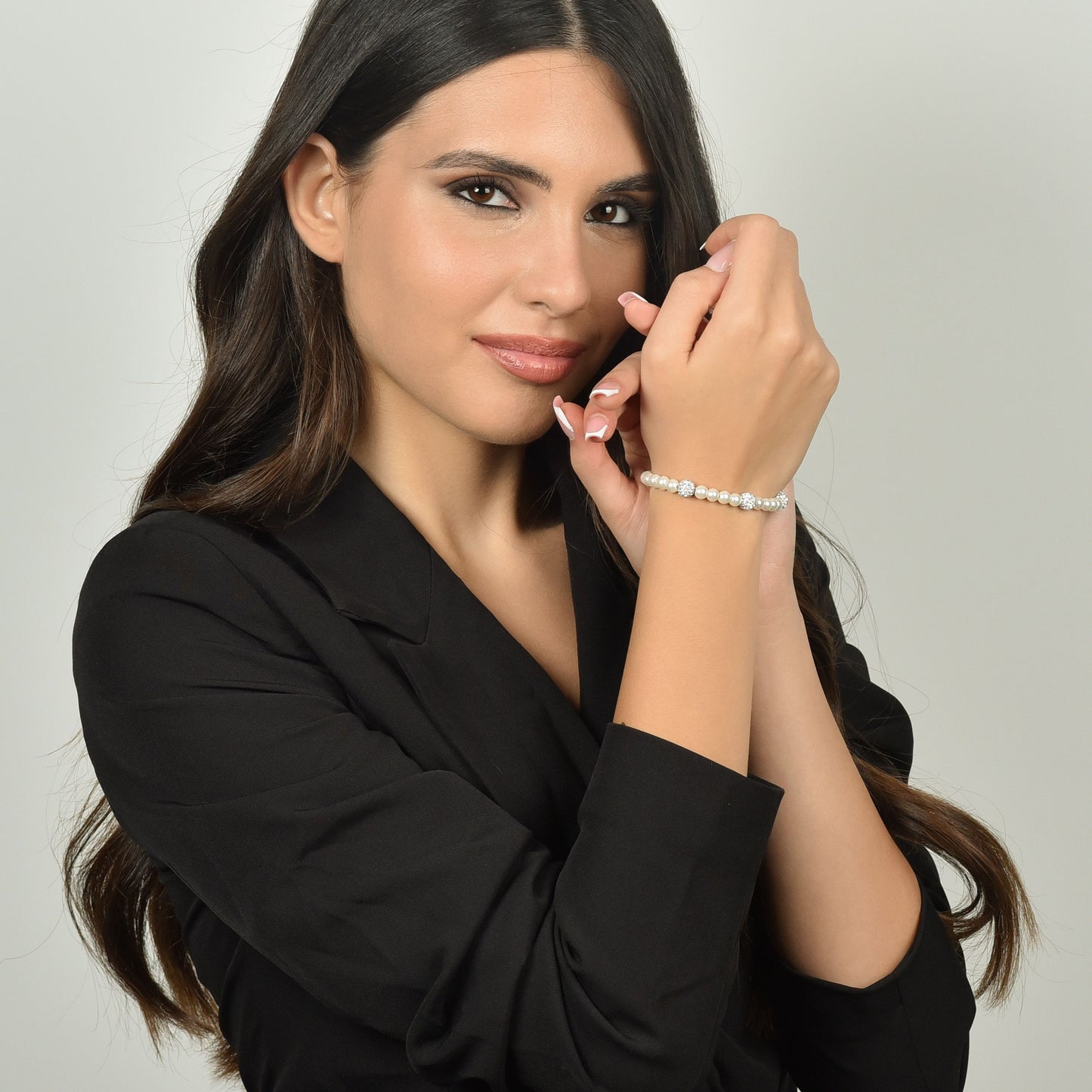 BRACCIALE DONNA DI PERLE SINTETICHE CON CRISTALLI BIANCHI