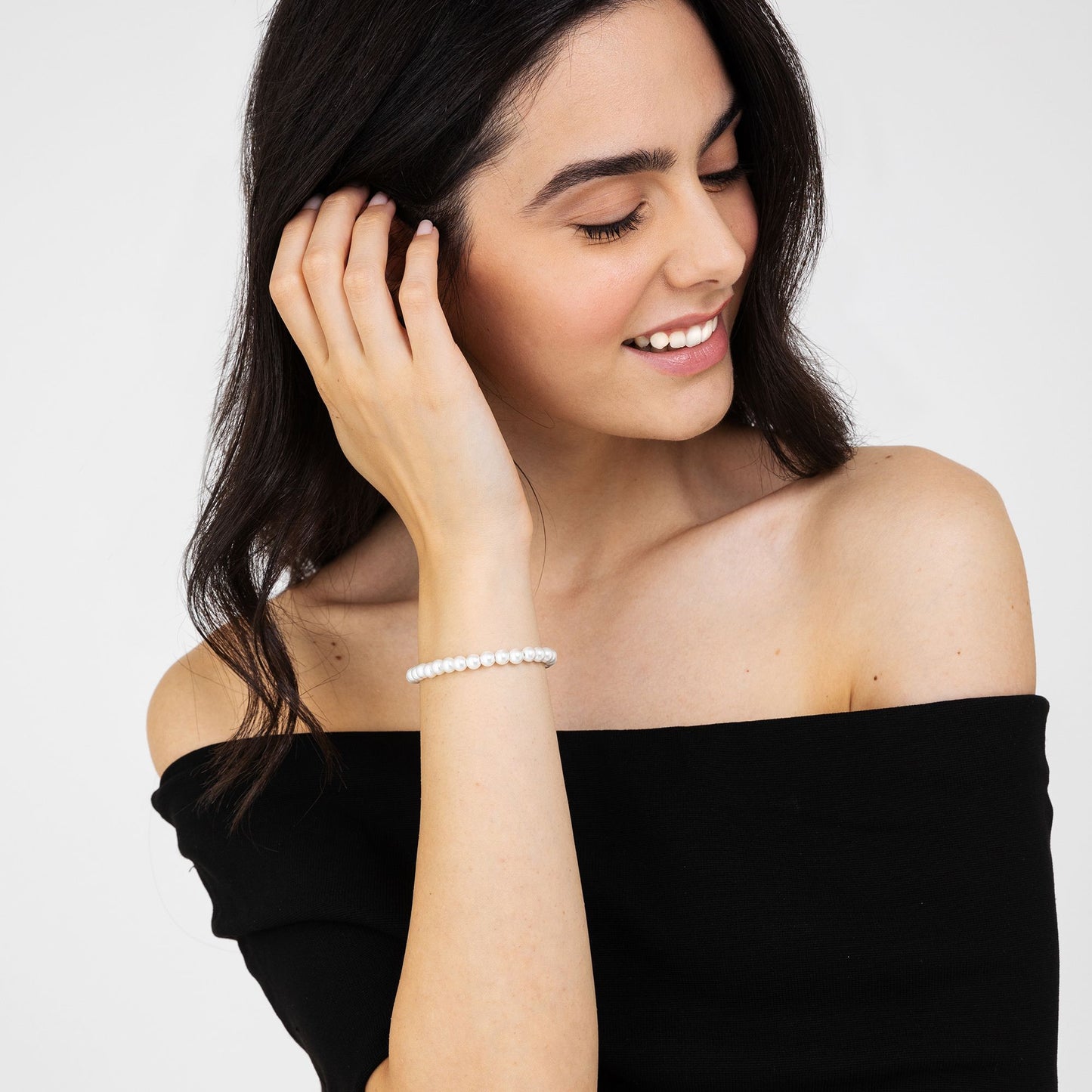 BRACCIALE DI PERLE SINTETICHE BIANCHE DONNA