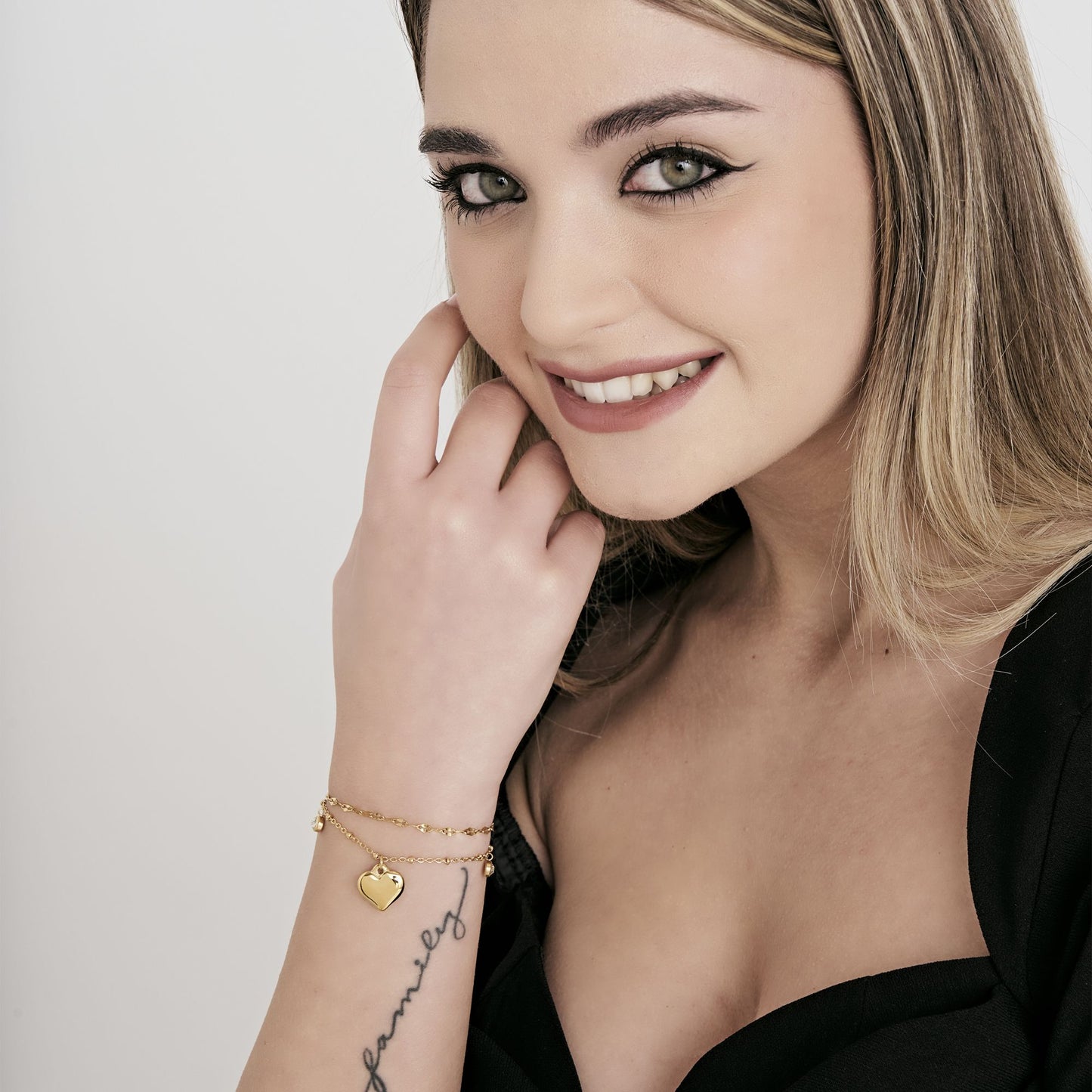 IP GOLD STAHL DAMENARMBAND MIT HERZ UND WEISSEN KRISTALLEN