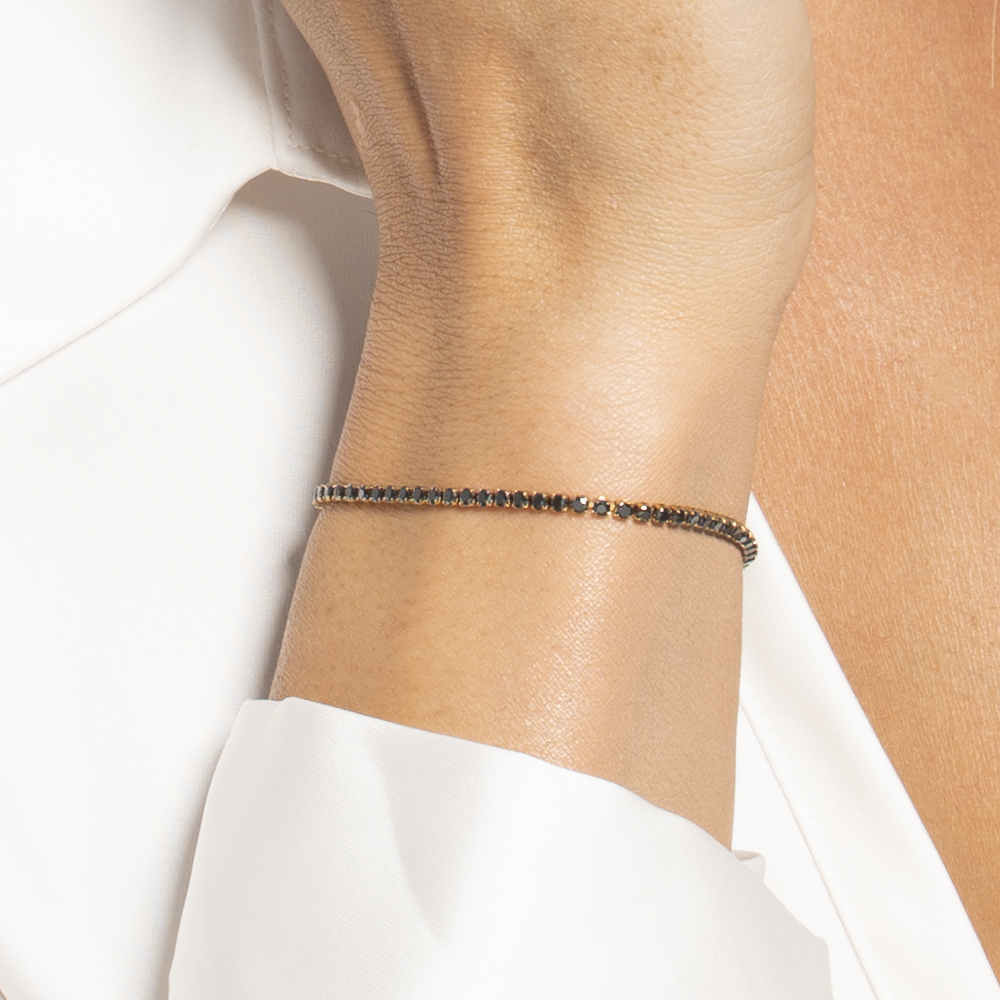 BRACCIALE TENNIS DONNA IN ACCIAIO COLORE ORO CON ZIRCONI NERI