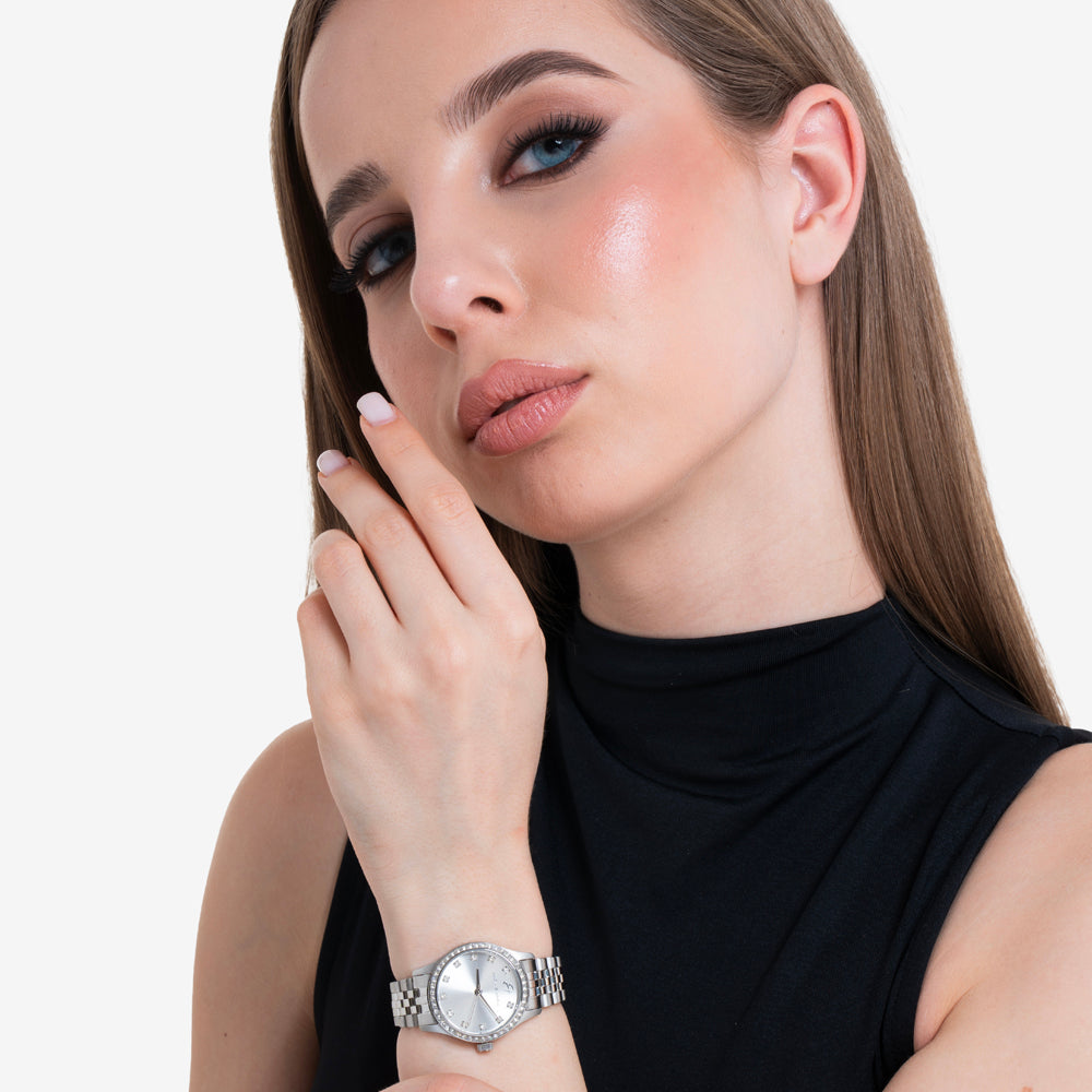 DAMENUHR AUS STAHL MIT SILBERNEM ZIFFERBLATT UND WEISSER KRISTALLLÜNETTE