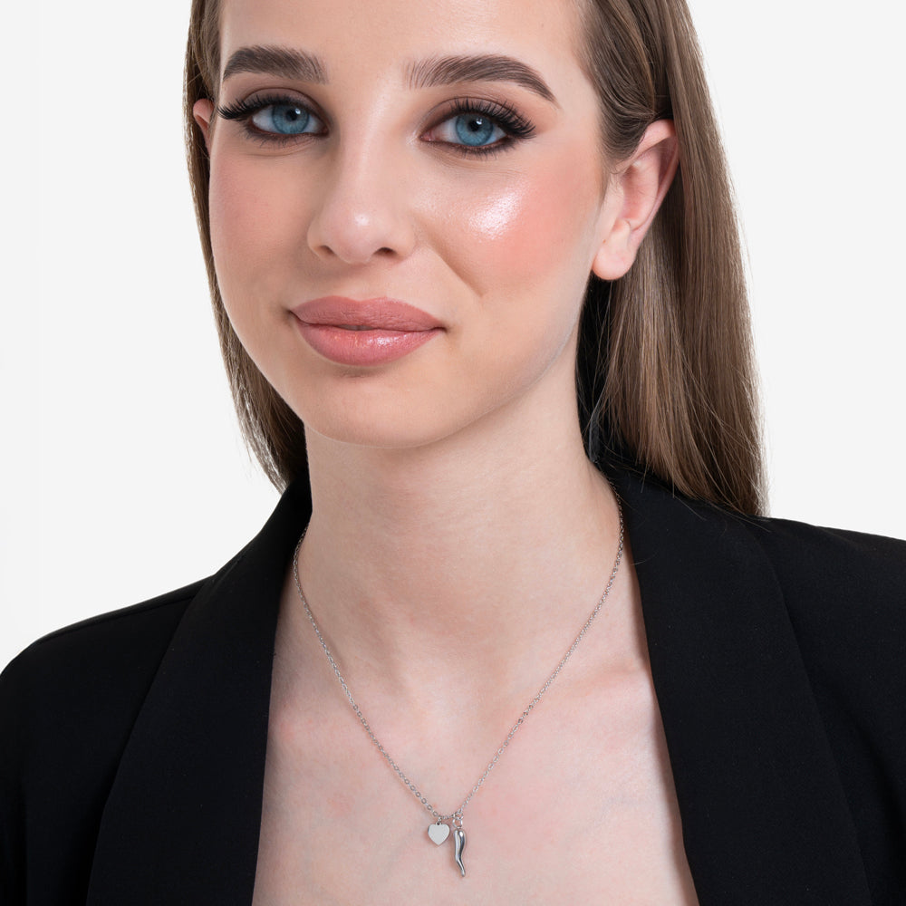 DAMENHALSKETTE AUS STAHL MIT HERZ UND HORN