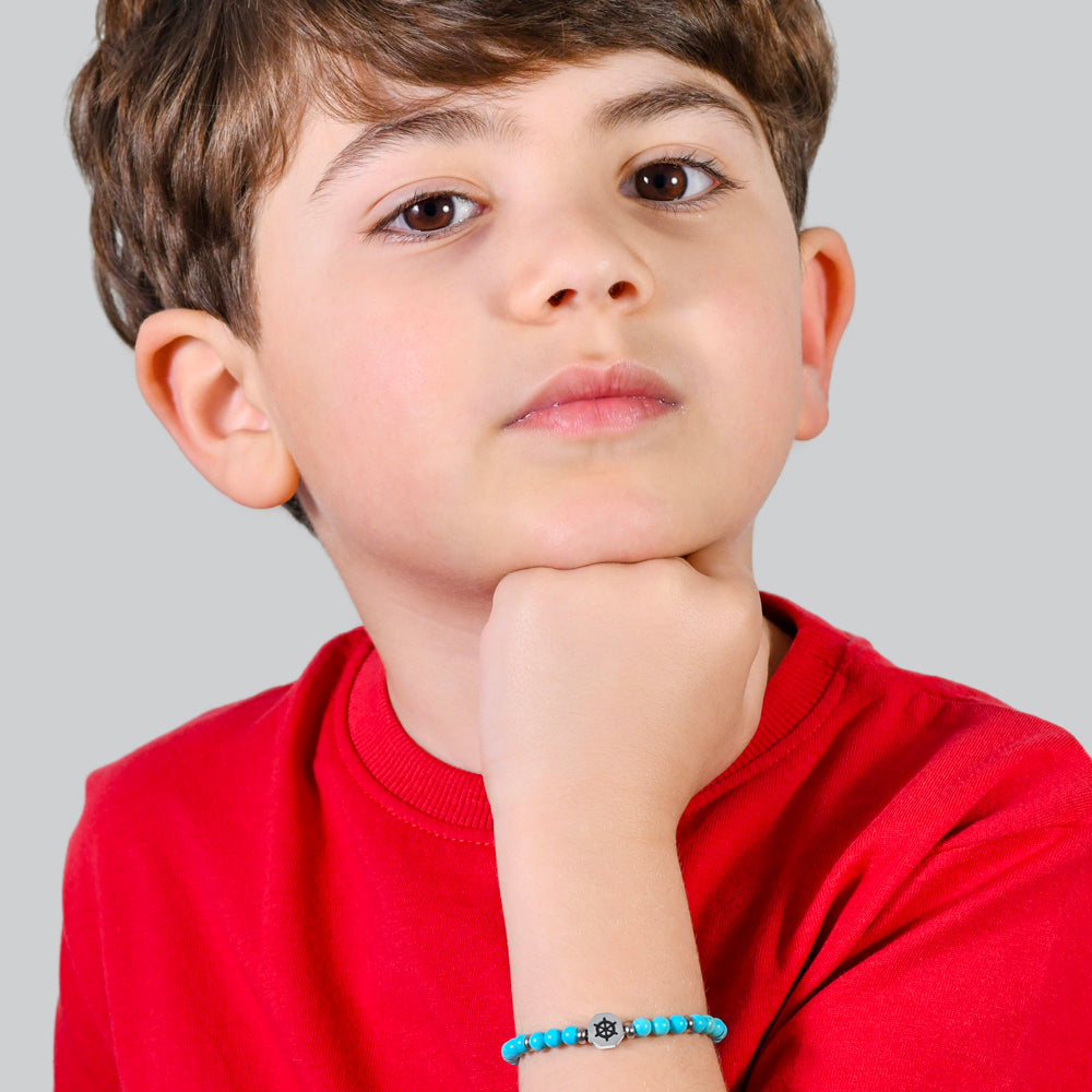 RUDERSTAHL-BABYARMBAND MIT TÜRKISFARBENEN STEINEN