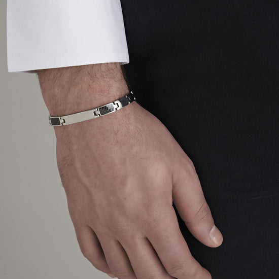 HERRENARMBAND MIT STAHLPLATTE UND SCHWARZEN ELEMENTEN