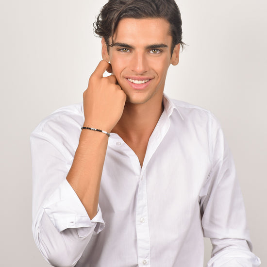 HERRENARMBAND AUS STAHL MIT SCHWARZEN STEINEN