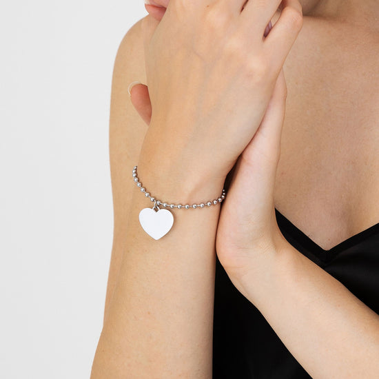 PERSONALISIERTES STAHLARMBAND FÜR FRAUEN MIT HERZEN
