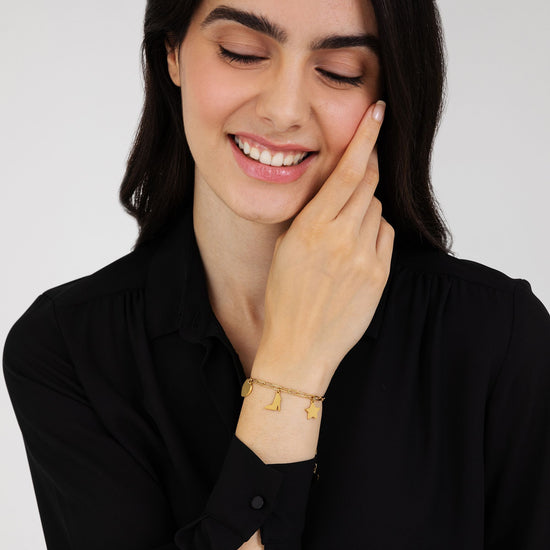 DAMENARMBAND AUS VERGOLDETEM STAHL MIT HERZ, SCHUH UND STERN