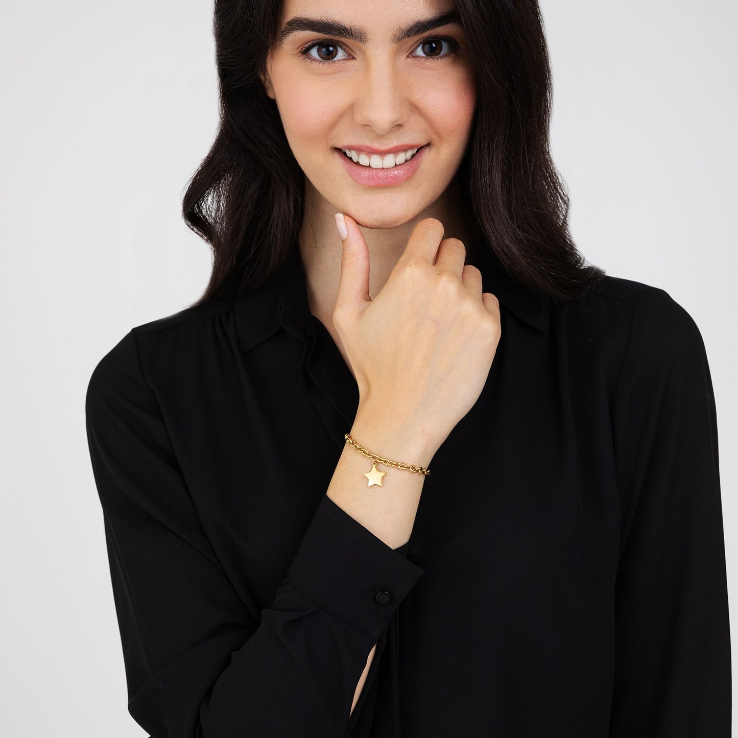 DAMENARMBAND AUS VERGOLDETEM STAHL MIT STERN