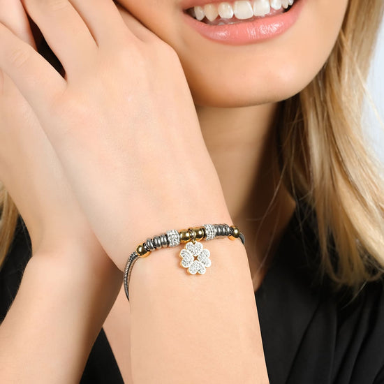 DAMENARMBAND AUS STAHL MIT VIERBLÄTTRIGEM KLEEBLATT MIT WEISSEN KRISTALLEN