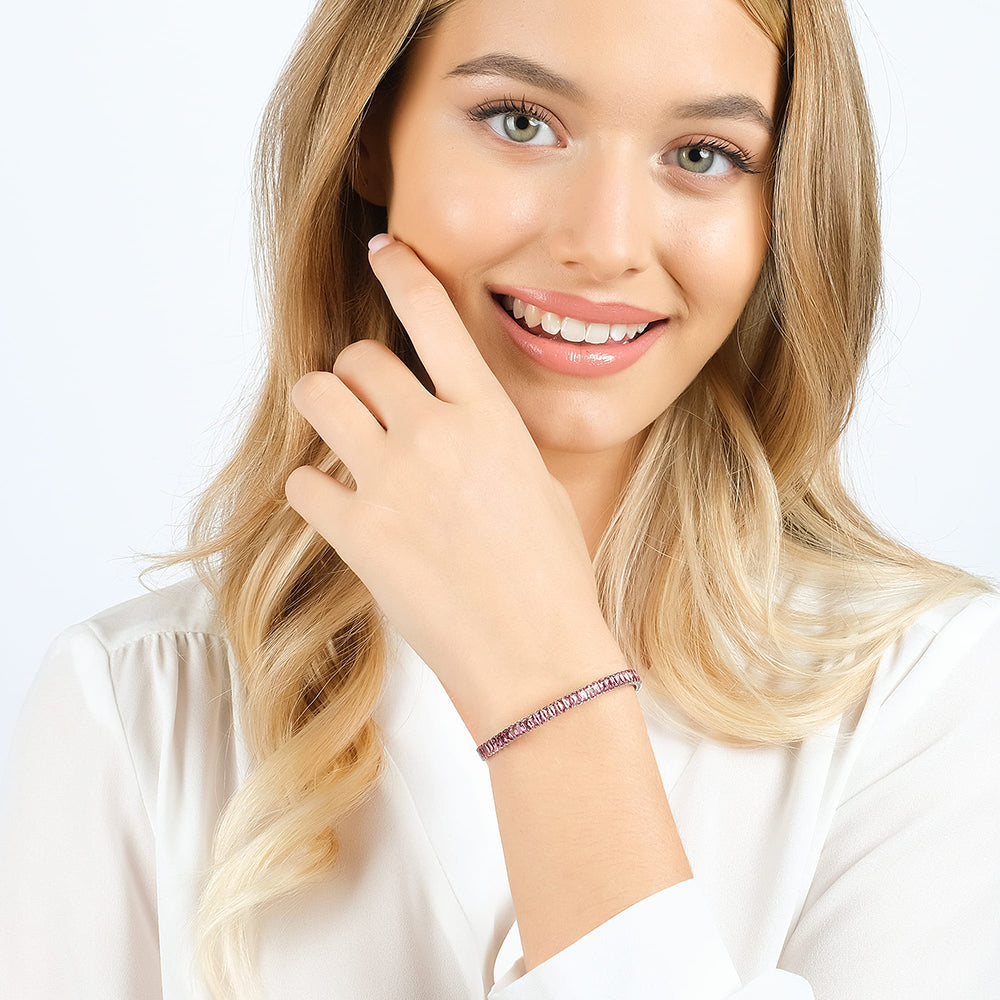 DAMENARMBAND AUS STAHL MIT FUCHSIAFARBENEN KRISTALLEN