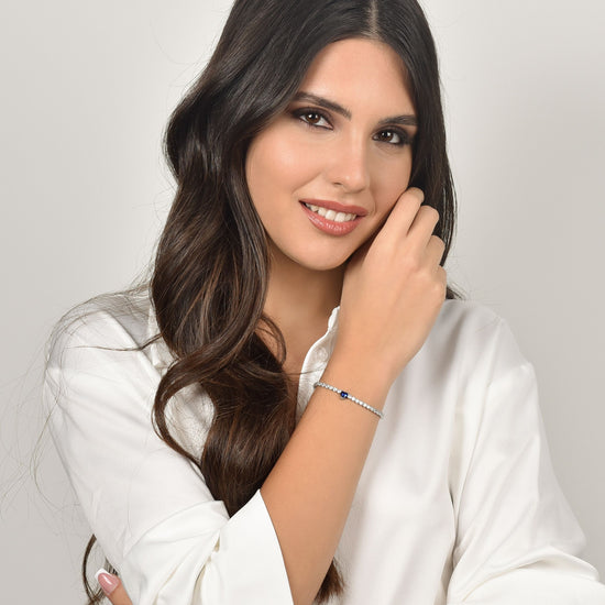 DAMEN-TENNISARMBAND AUS STAHL MIT WEISSEN KRISTALLEN UND BLAUEM KRISTALLHERZ