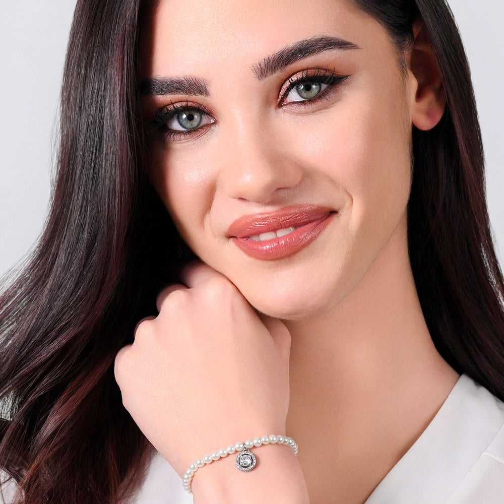 DAMENARMBAND AUS STAHL MIT PERLE UND WEISSEM ZIRKON