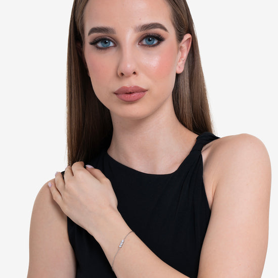 DAMENARMBAND AUS STAHL MIT WEISSEN KRISTALLEN