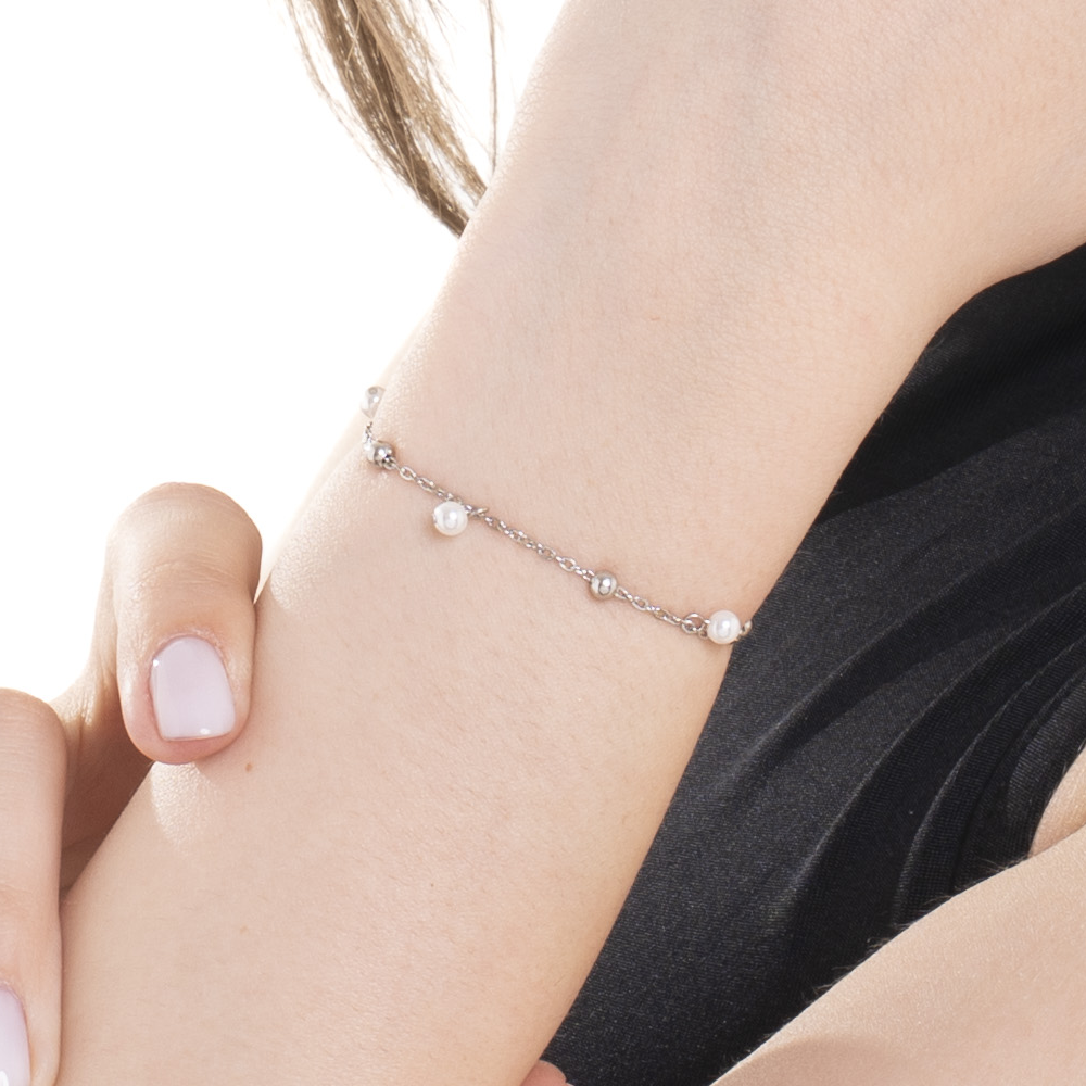 DAMENARMBAND AUS STAHL MIT WEISSEN PERLEN