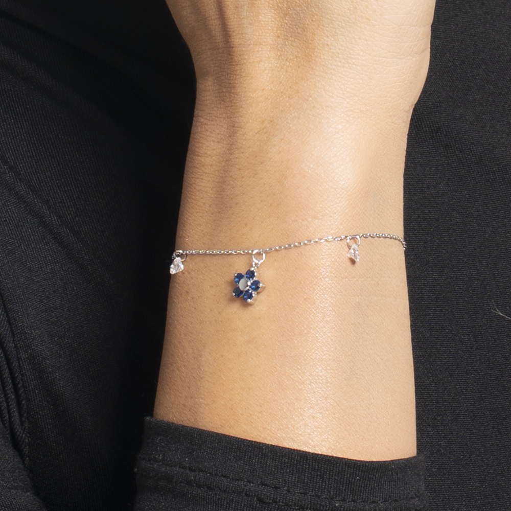 BRACCIALE DONNA IN ACCIAIO CON PENDENTE FIORE E PETALI ZIRCONE BLU