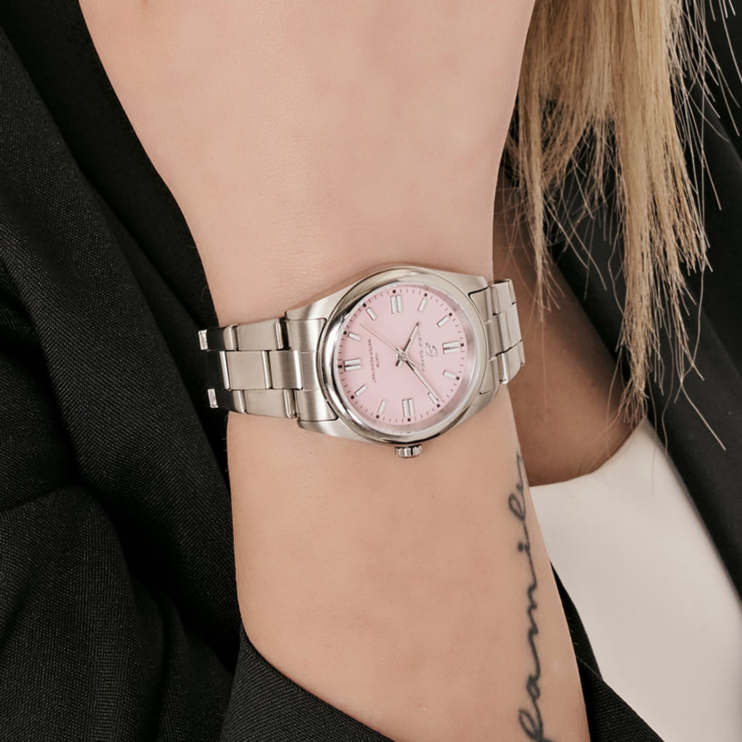 DAMENUHR AUS STAHL MIT ROSA ZIFFERBLATT