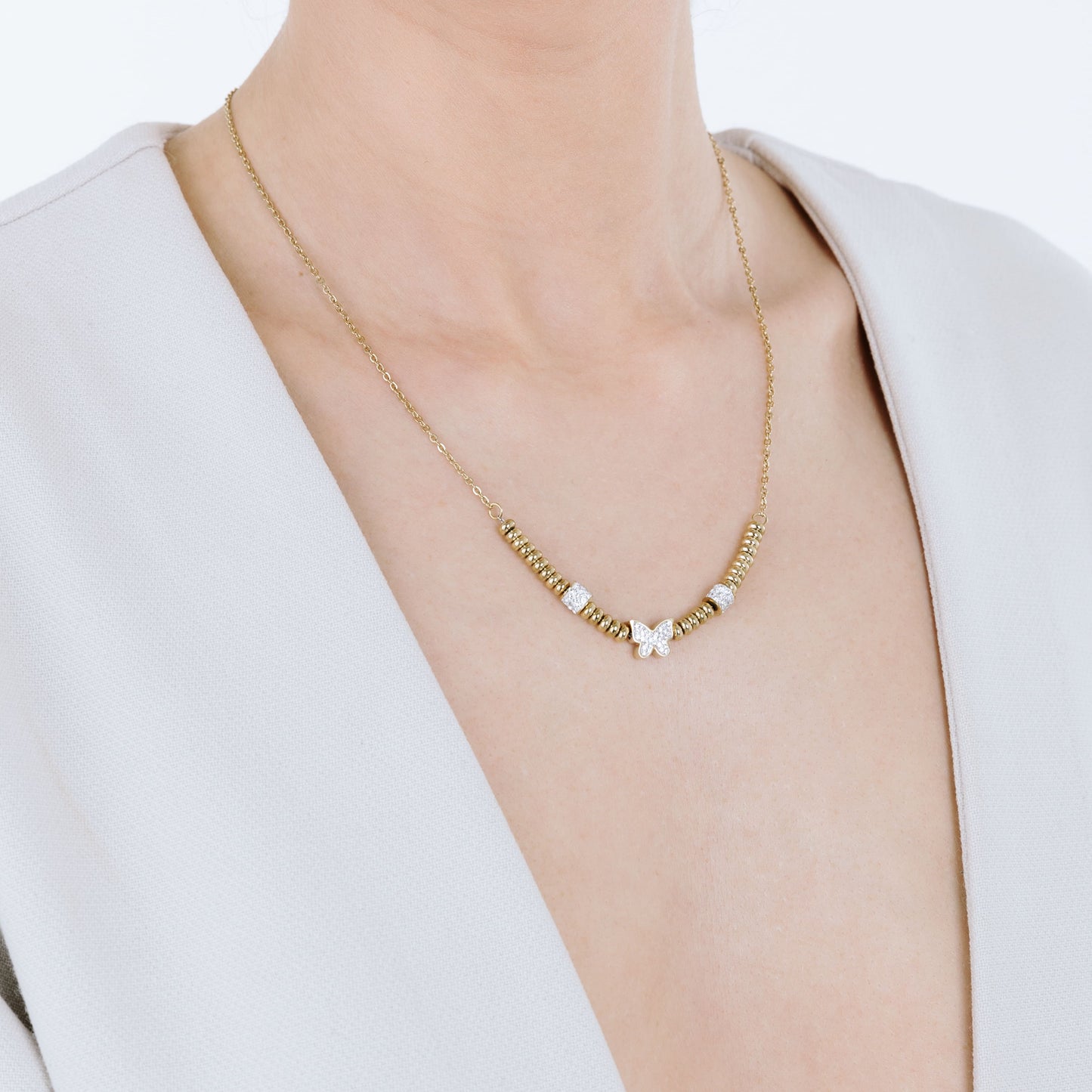 IP GOLD STAHL HALSKETTE MIT WEISSEM KRISTALL SCHMETTERLING