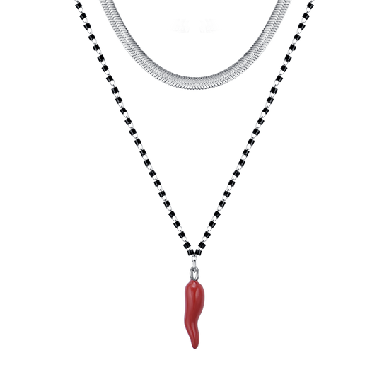 DAMENHALSKETTE AUS STAHL MIT HORN MIT ROTER EMAILLE UND SCHWARZEN ELEMENTEN