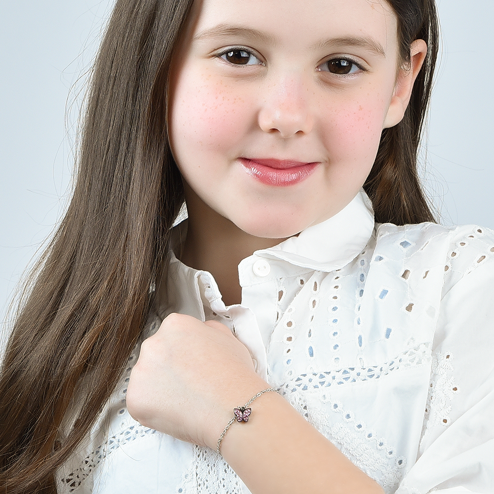 STAHLARMBAND FÜR MÄDCHEN MIT SCHMETTERLING UND ROSA KRISTALLEN