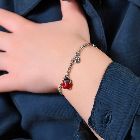 BRACCIALE BAMBINA IN ACCIAIO CON COCCINELLA CON SMALTO ROSSO E NERO E CRISTALLO Luca Barra